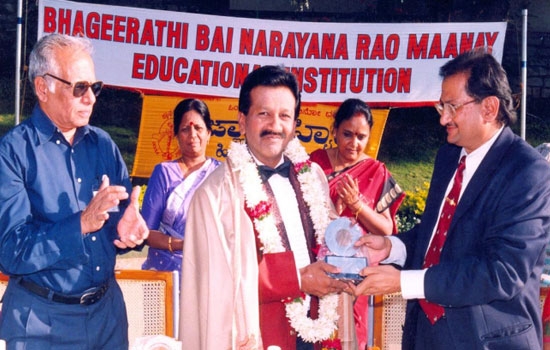 Magician Prasad honoured by RAJASHREE DHARMASTHALA Dharmadhikari Dr.Veerendra Hegde.